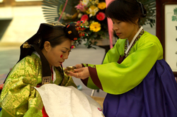 Ilsu receiving the wedding toast with Hae Kyong
