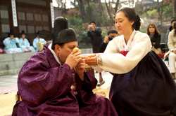 Kaz receiving the wedding toast with Eun Jin